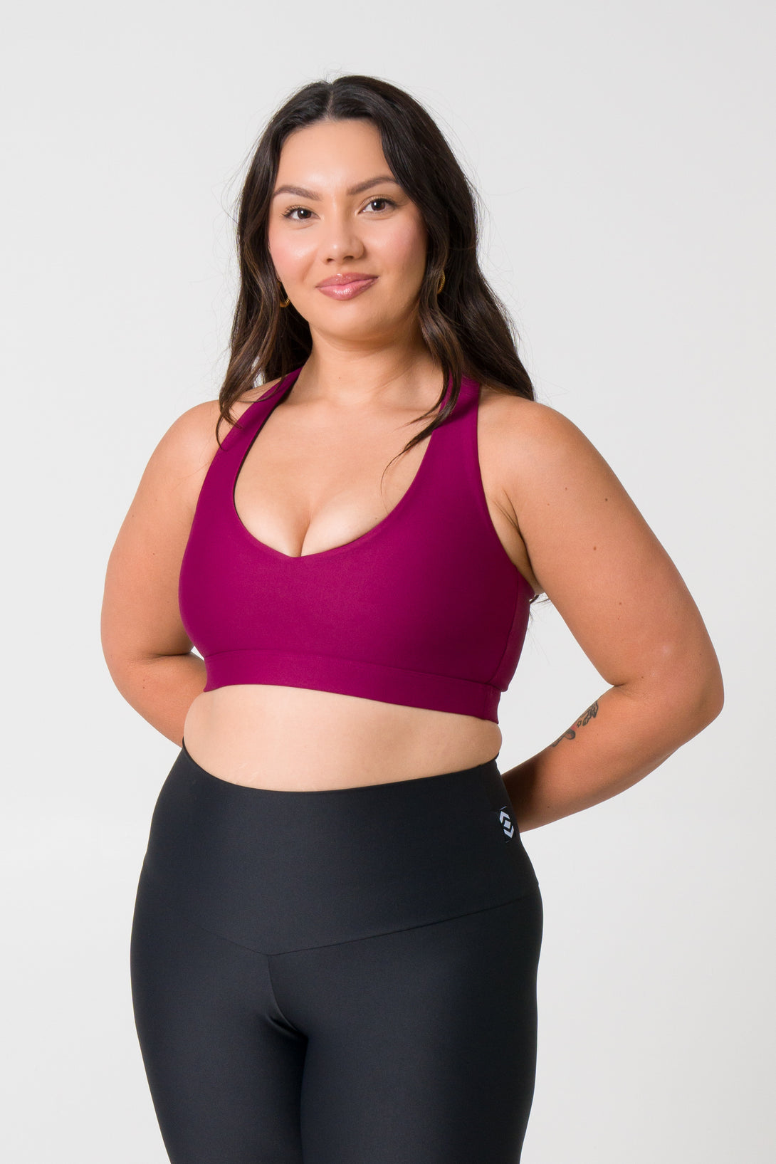 ExoticAthletica Women's Activewear Berry Performance Deep V Crop - Stylish and supportive activewear for women, featuring a deep V neckline and vibrant berry color. Perfect for workouts or casual wear.