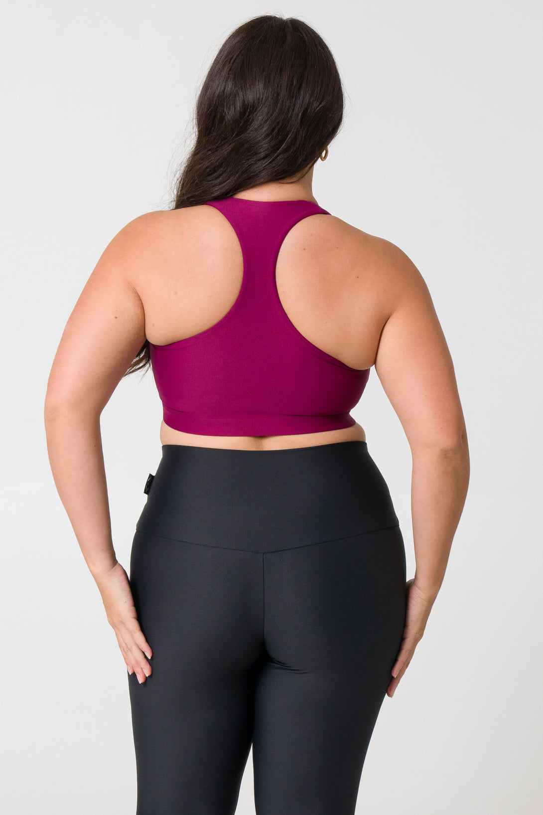 ExoticAthletica Women's Activewear Berry Performance Deep V Crop - Stylish and supportive activewear for women, featuring a deep V neckline and vibrant berry color. Perfect for workouts or casual wear.