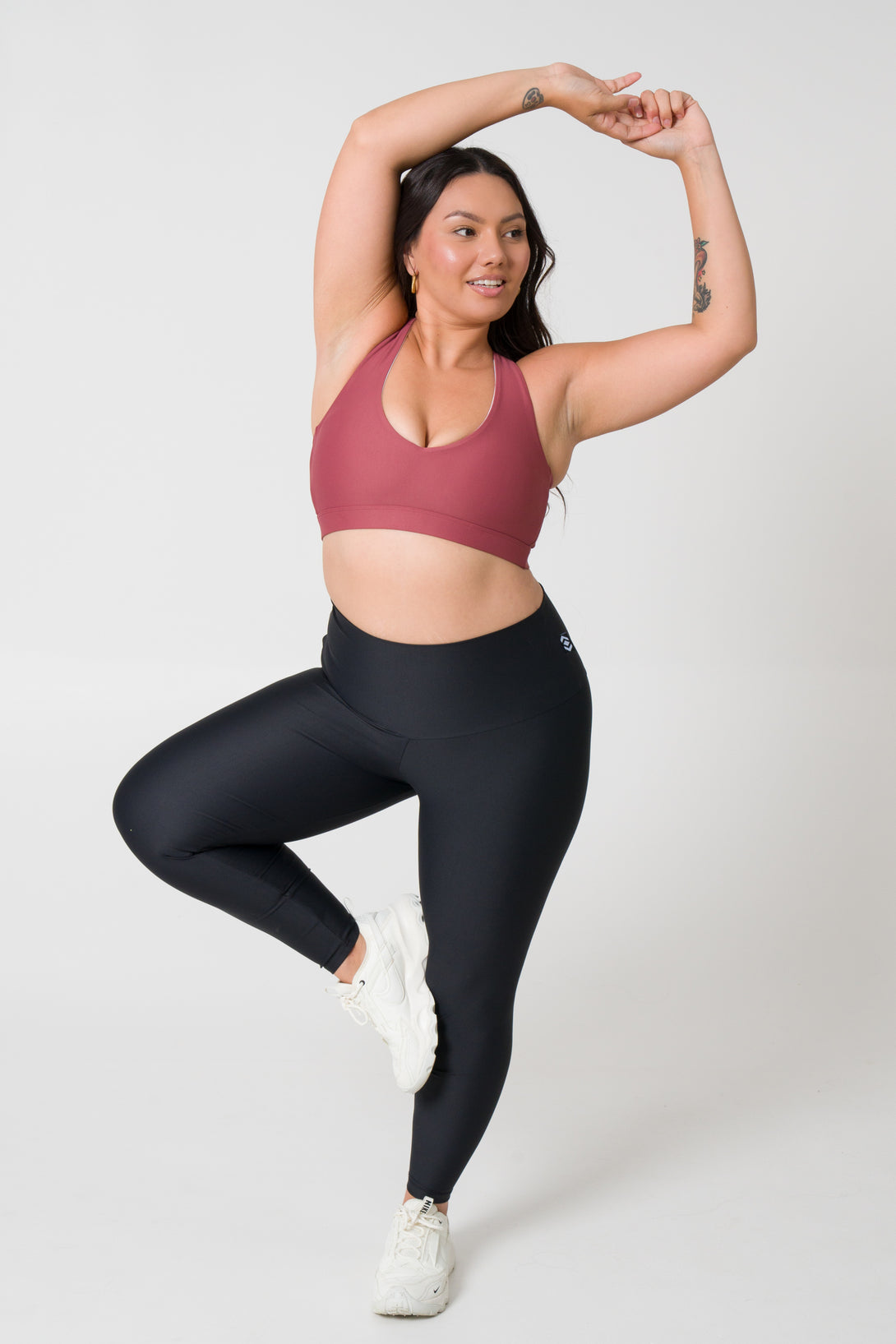 Blush deep V crop top, offering style and support for active women during workouts or everyday activities